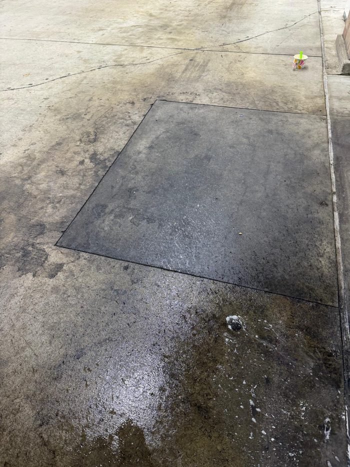 Commercial concrete mid-clean showing contrast