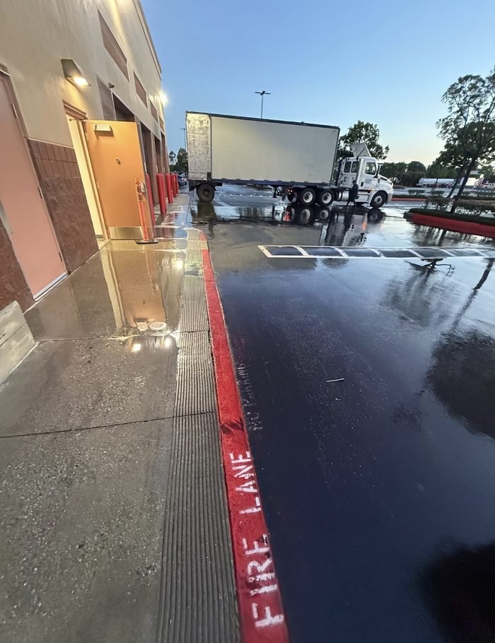 Commercial parking or drive-area pressure washing